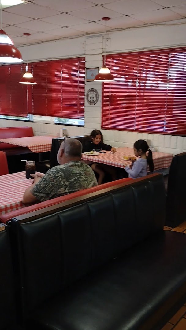 Restaurant seating area with accessible table space.