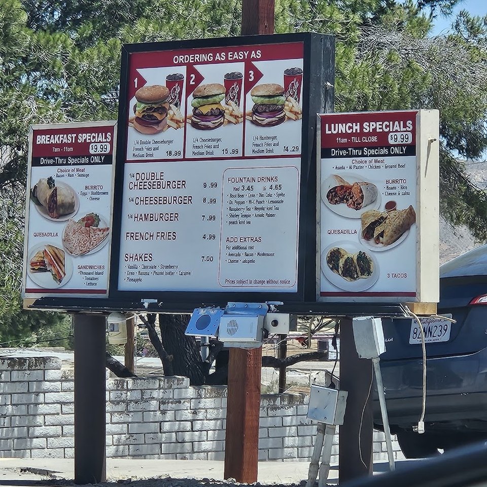 Cafe menu page with chicken, steak, and shrimp plates.